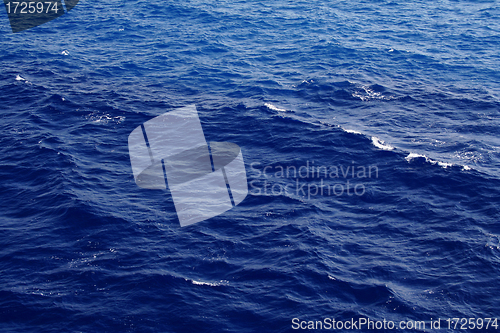 Image of Dark blue sea water surface with ripple 