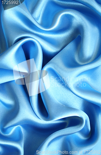 Image of Smooth elegant blue silk as background