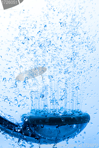 Image of Shower Head with Running Water