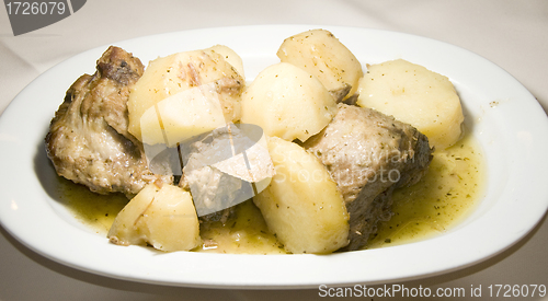 Image of Greek food lamb lemon sauce with potatoes