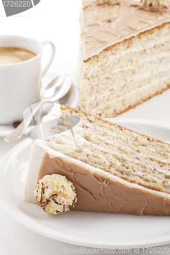 Image of nut cake with coffee isolated on white background