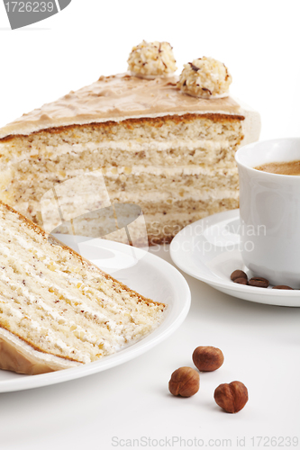 Image of nut cake with coffee isolated on white background