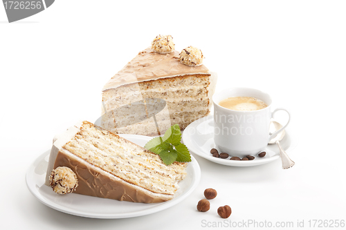 Image of nut cake with coffee isolated on white background