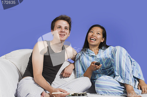 Image of couple watching TV