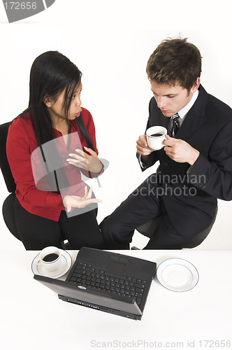 Image of business people drinking coffee