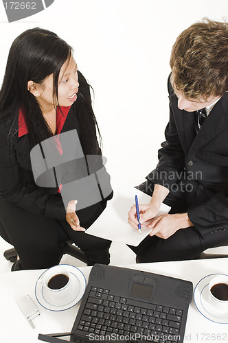 Image of business people talking