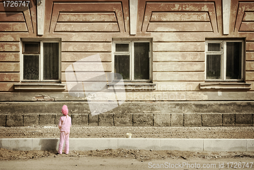 Image of child and house