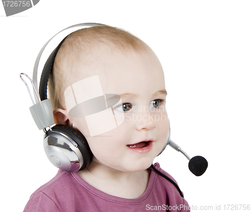 Image of young child with headset