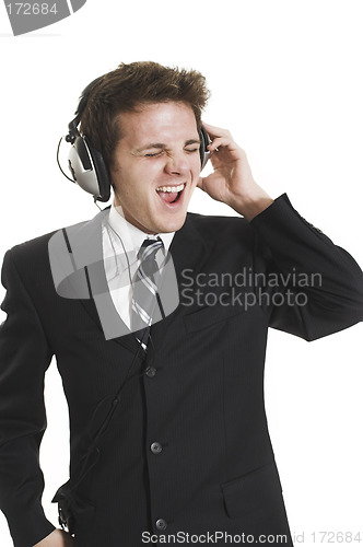 Image of man listening to music