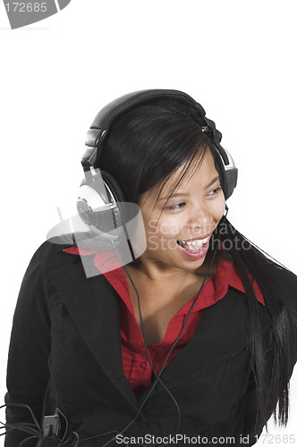 Image of woman listening to music