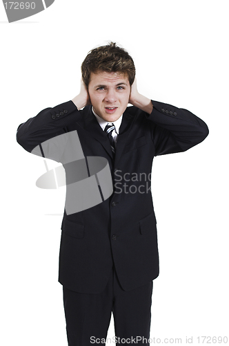 Image of man plugging his ears
