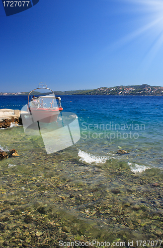 Image of red boat