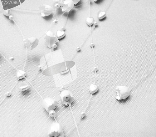 Image of Wedding jewel details. flowers and herats