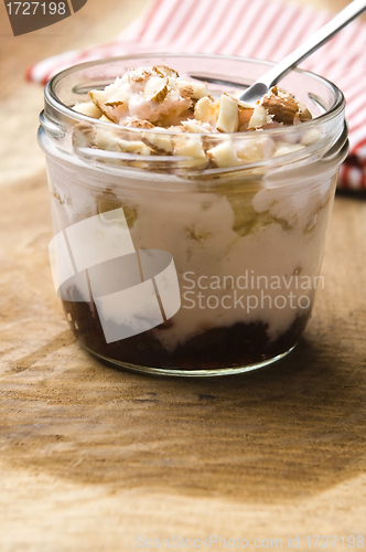 Image of Sweet dessert in glass jar - strawberry cake