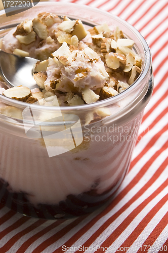 Image of Sweet dessert in glass jar - strawberry cake