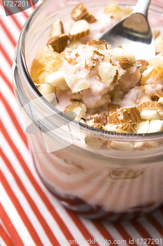 Image of Sweet dessert in glass jar - strawberry cake