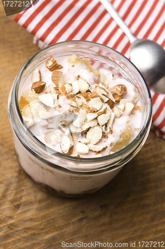 Image of Sweet dessert in glass jar - strawberry cake