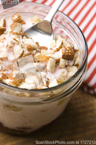 Image of Sweet dessert in glass jar - strawberry cake