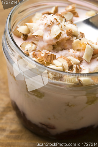 Image of Sweet dessert in glass jar - strawberry cake