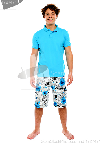 Image of Man standing in shorts