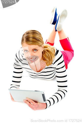 Image of Young woman holding her tablet computer