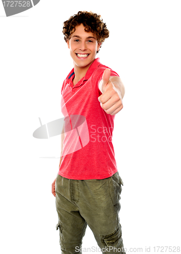 Image of Smart guy standing with thumbs-up