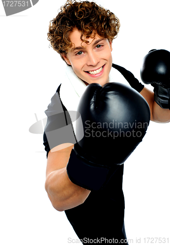 Image of Young man in a aggressive action