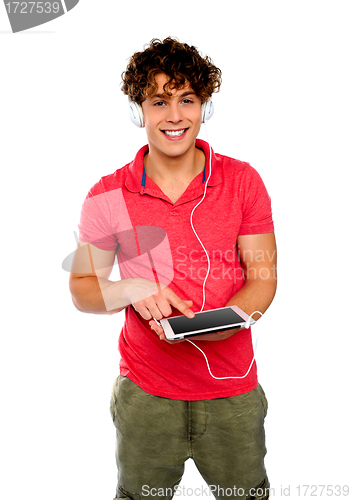 Image of Guy enjoying music. Geek person