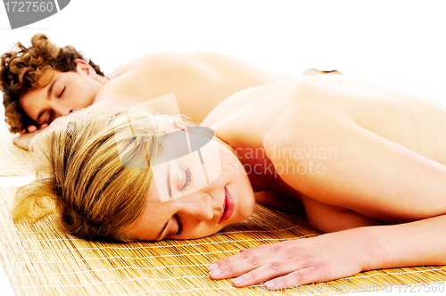 Image of Attractive young couple on spa treatments