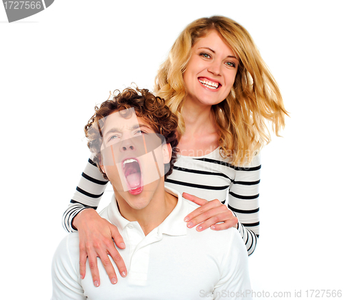 Image of Couple, girl smiling boy yawning