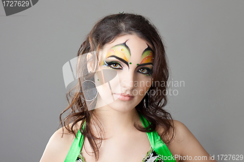 Image of Portrait of beautiful girl with idnian make up