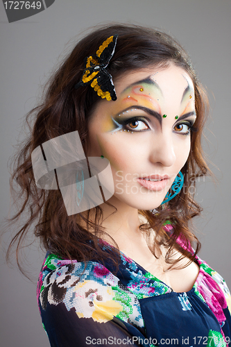 Image of Portrait of cute girl with idnian make up