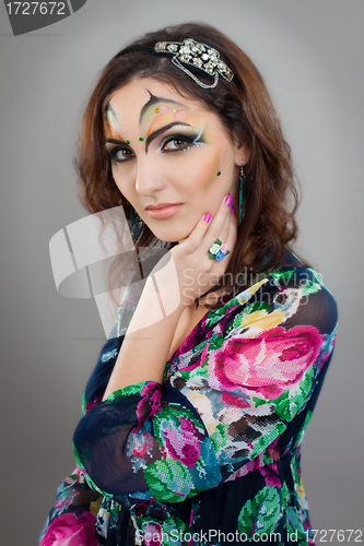 Image of Portrait of beautiful girl with idnian make up