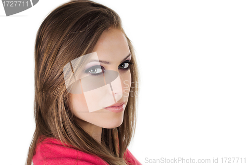 Image of Face of a beautiful young woman with brown long hairs