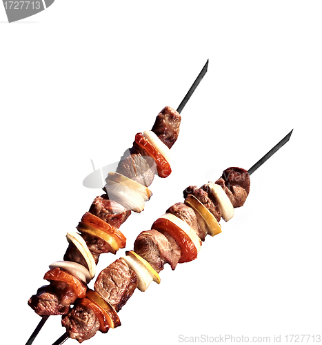 Image of pork shish kebab on white