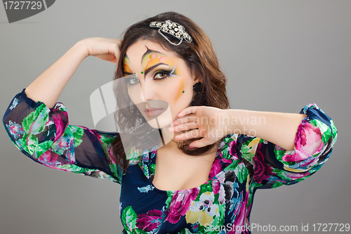 Image of Portrait of beautiful girl with idnian make up