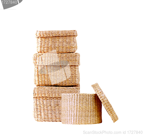 Image of isolated round woven straw basket