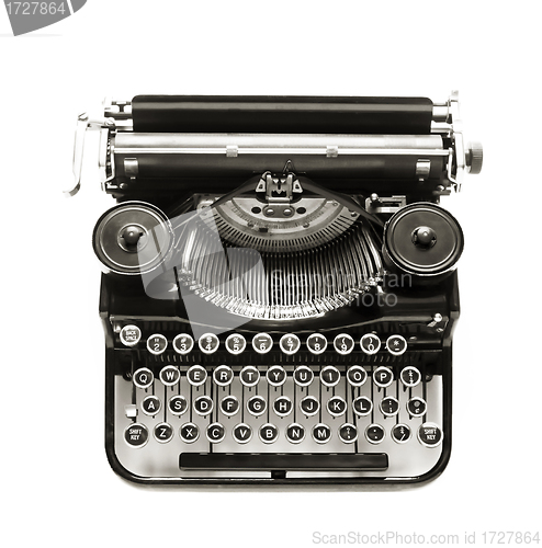 Image of Antique typewriter a white backdrop.