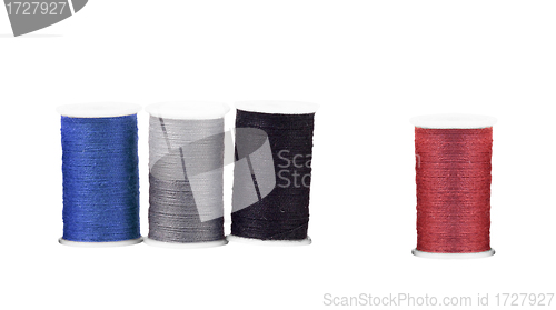 Image of Colourful spools of thread isolated on white background