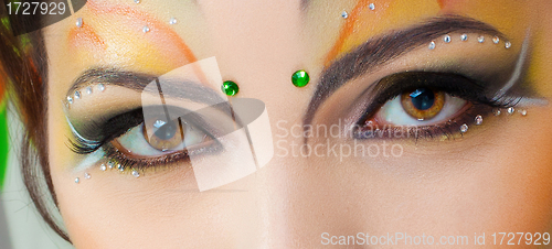 Image of Portrait of cute girl with idnian make up