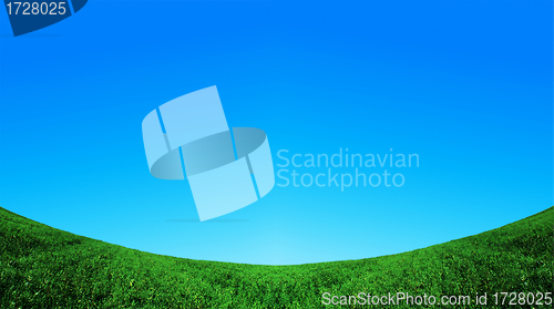 Image of green field and blue sky background