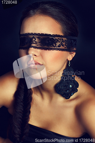 Image of Fashion portrait of the young woman blindfold