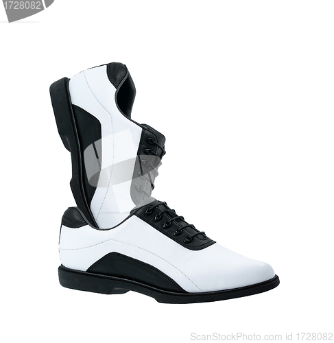 Image of A pair of white golf shoes isolated