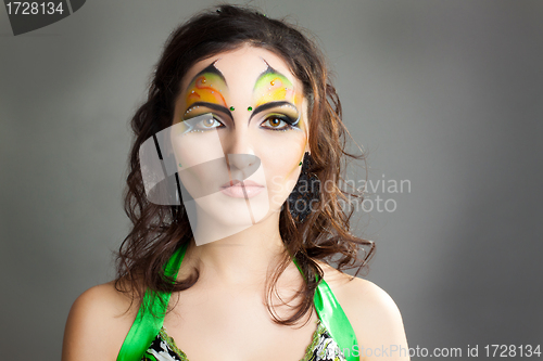 Image of Portrait of beautiful girl with idnian make up