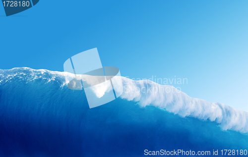 Image of Large Blue Surfing Wave