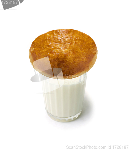Image of milk and bun isolated on white