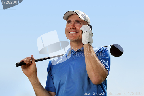 Image of Golfer using mobile phone 