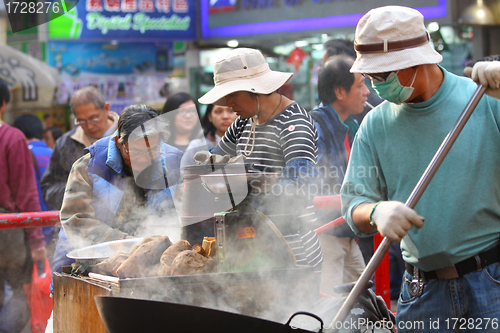 Image of Sweet potatoes hawker in Hong Kong