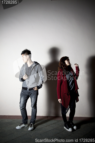 Image of Asian stylish man and woman on street