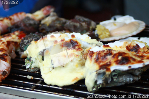 Image of Cooking oysters with cheese